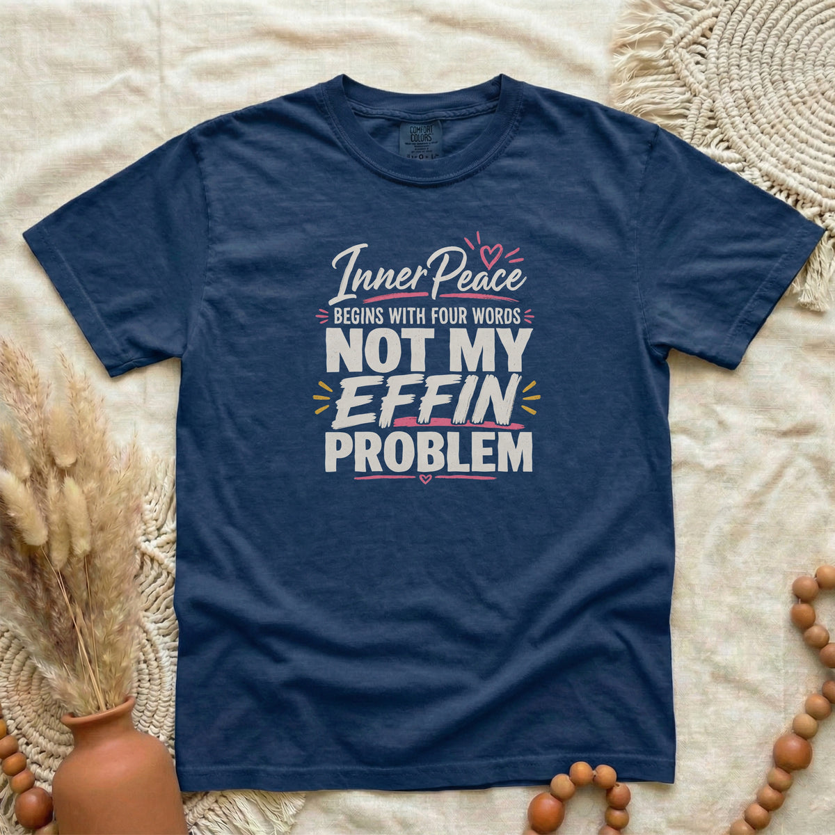 True Navy garment-dyed cotton tee printed with "Inner Peace Begins With Four Words: Not My Effin Problem".