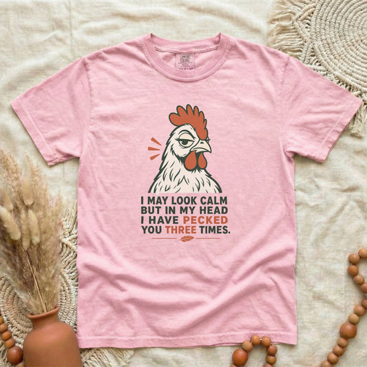 Blossom garment-dyed cotton tee printed with "I May Look Calm But In My Head I Have Pecked You Three Times".