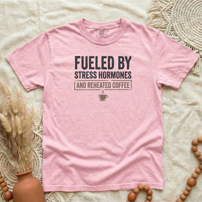 Blossom garment-dyed cotton tee printed with "Fueled By Stress Hormones And Reheated Coffee".
