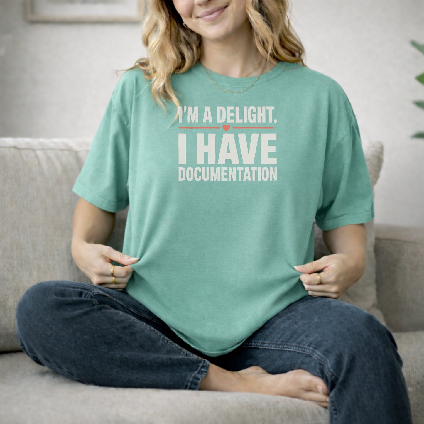 Island Green garment-dyed cotton tee printed with "I'm A Delight. I Have Documentation."