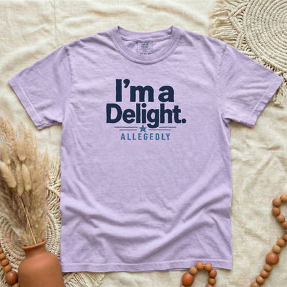 Orchid garment-dyed cotton tee printed with "I'm A Delight, Allegedly".