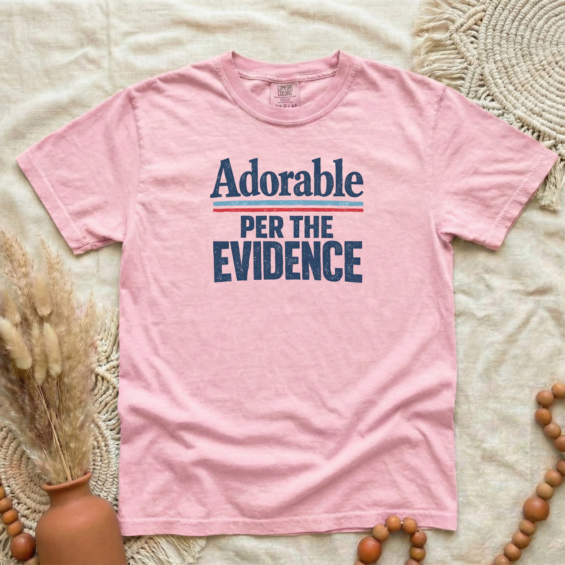 Blossom garment-dyed cotton tee printed with "Adorable, Per The Evidence".