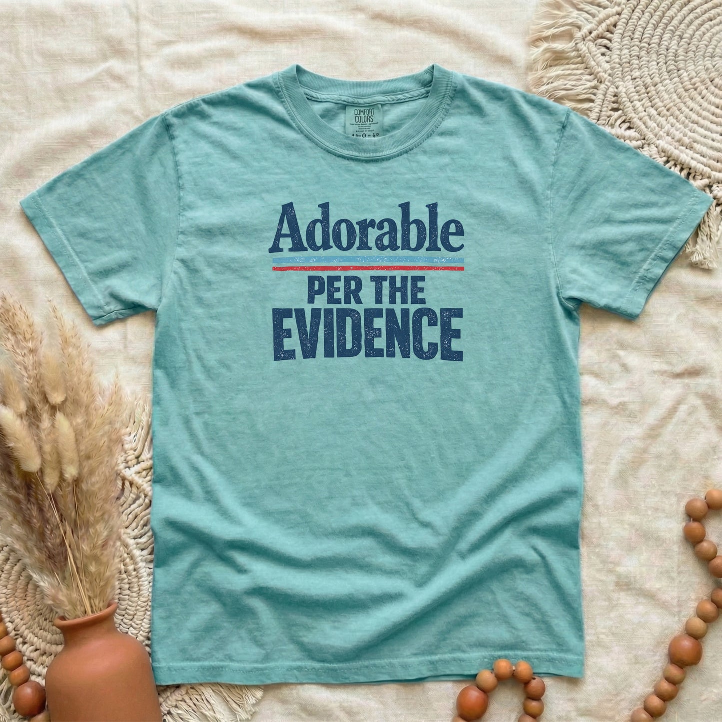 Chalky Mint garment-dyed cotton tee printed with "Adorable, Per The Evidence".