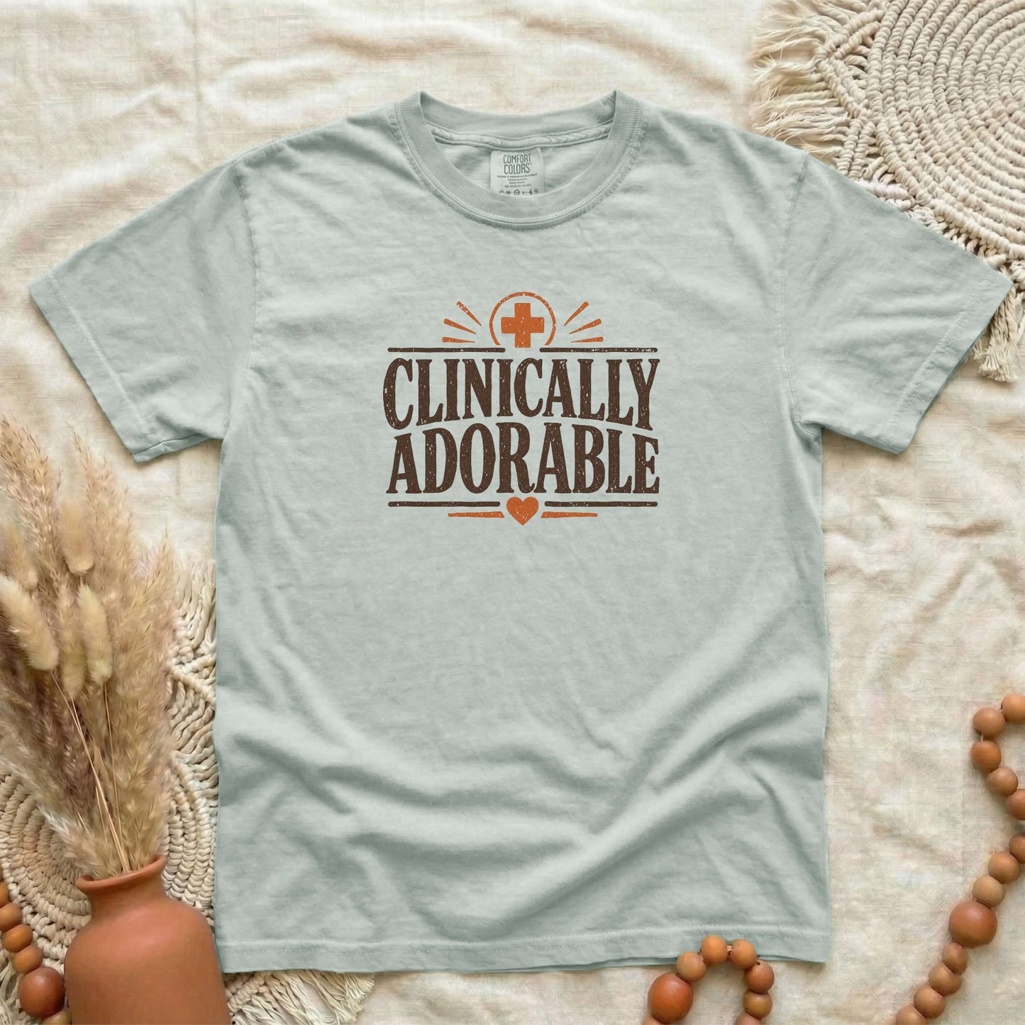 Bay garment-dyed cotton tee printed with "Clinically Adorable".