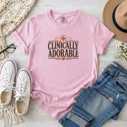 Blossom garment-dyed cotton tee printed with "Clinically Adorable".