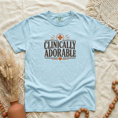 Chambray garment-dyed cotton tee printed with "Clinically Adorable".