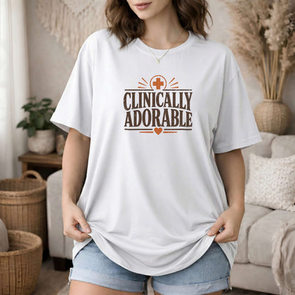 White garment-dyed cotton tee printed with "Clinically Adorable".