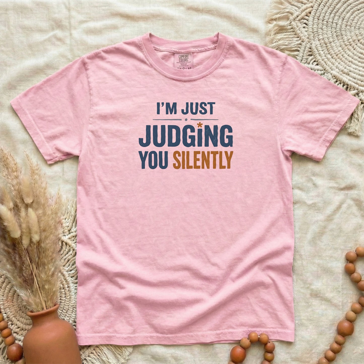 Blossom garment-dyed cotton tee printed with "Judging You Silently".