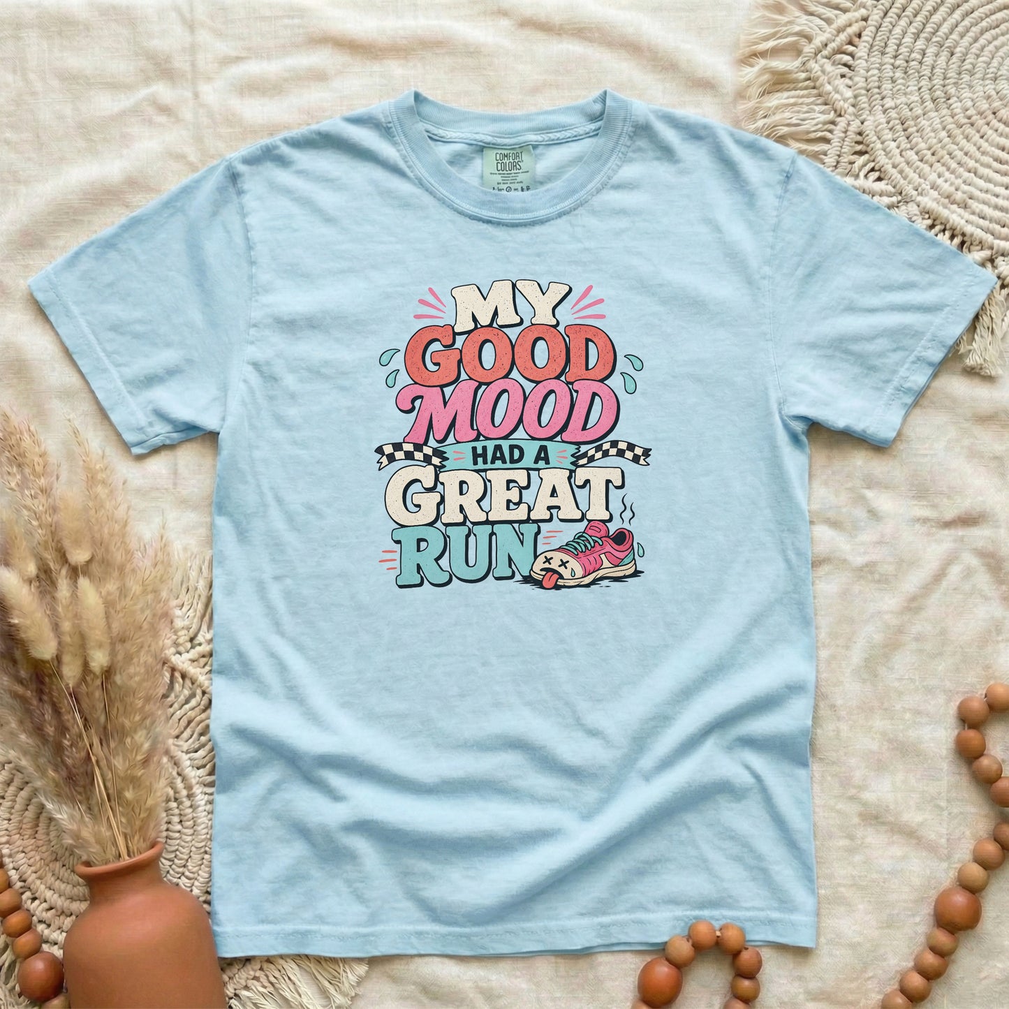 Chambray garment-dyed cotton tee printed with "My Good Mood Had A Great Run".