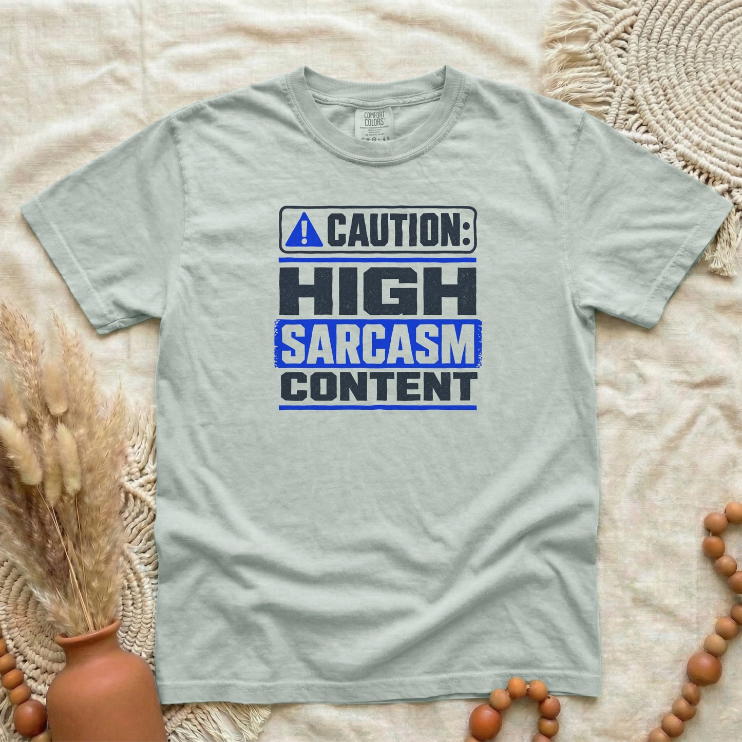 Bay garment-dyed cotton tee printed with "Caution: High Sarcasm Content".