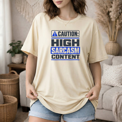 Ivory garment-dyed cotton tee printed with "Caution: High Sarcasm Content".