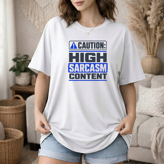 White garment-dyed cotton tee printed with "Caution: High Sarcasm Content".