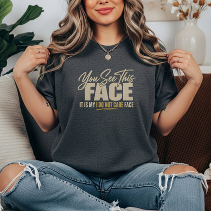 Pepper garment-dyed cotton tee printed with "You See This Face, It Is My I Do Not Care Face".