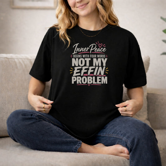 Black garment-dyed cotton tee printed with "Inner Peace Begins With Four Words: Not My Effin Problem".