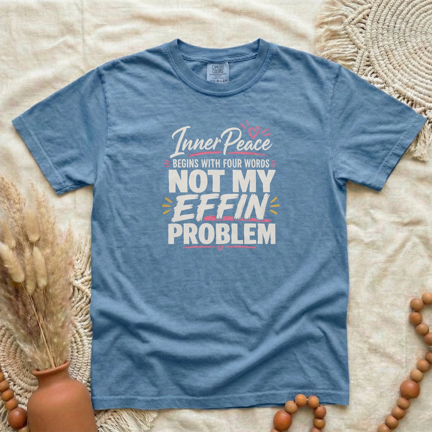 Blue Jean garment-dyed cotton tee printed with "Inner Peace Begins With Four Words: Not My Effin Problem".
