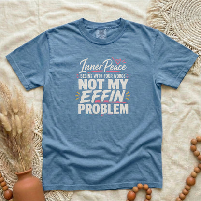 Blue Jean garment-dyed cotton tee printed with "Inner Peace Begins With Four Words: Not My Effin Problem".