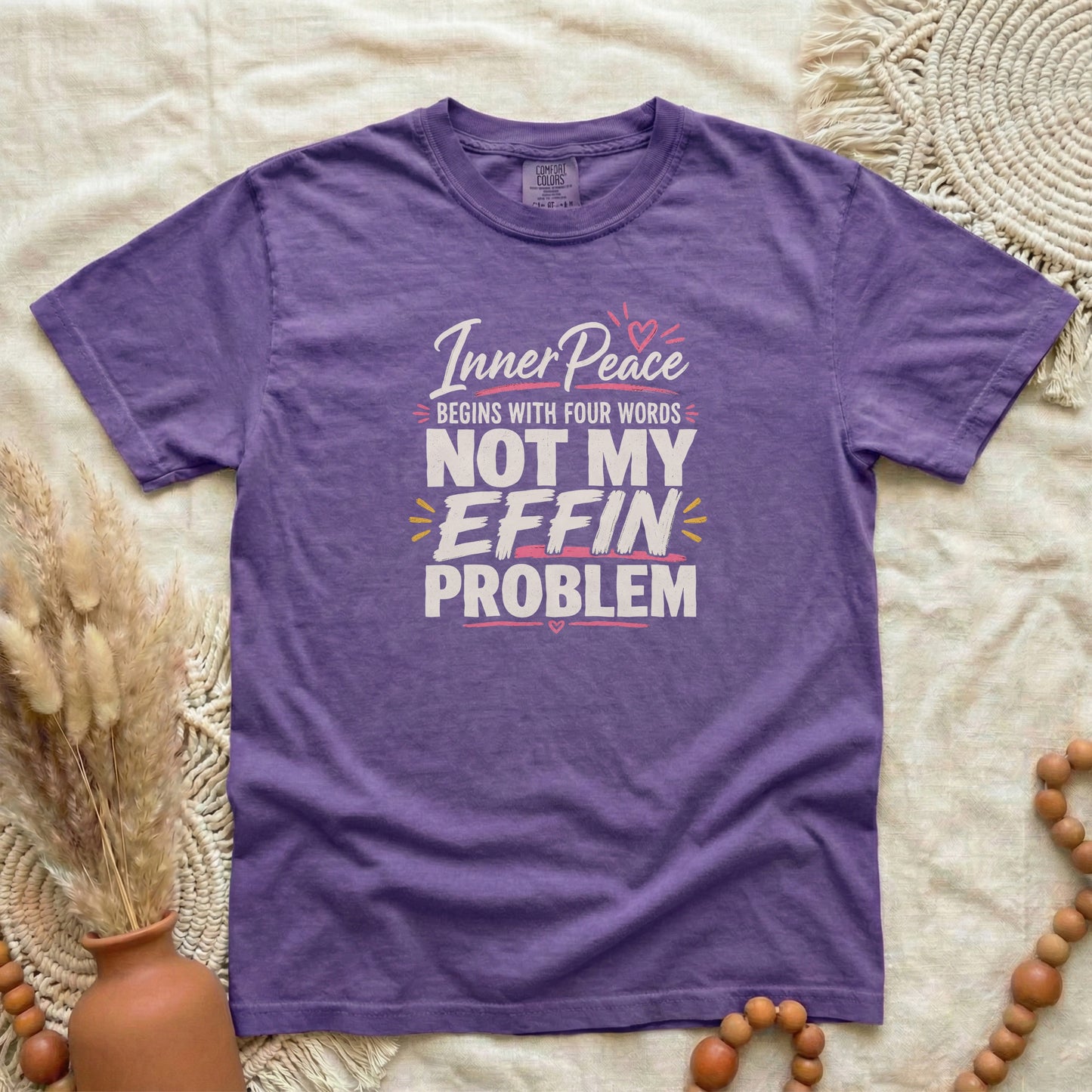 Grape garment-dyed cotton tee printed with "Inner Peace Begins With Four Words: Not My Effin Problem".