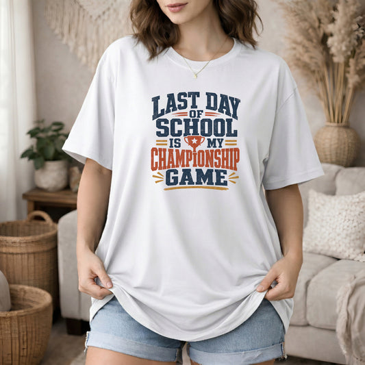 White garment-dyed cotton tee printed with "Last Day Of School Is My Championship Game".