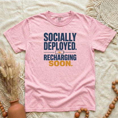 Blossom garment-dyed cotton tee printed with "Socially Deployed. Recharging Soon."