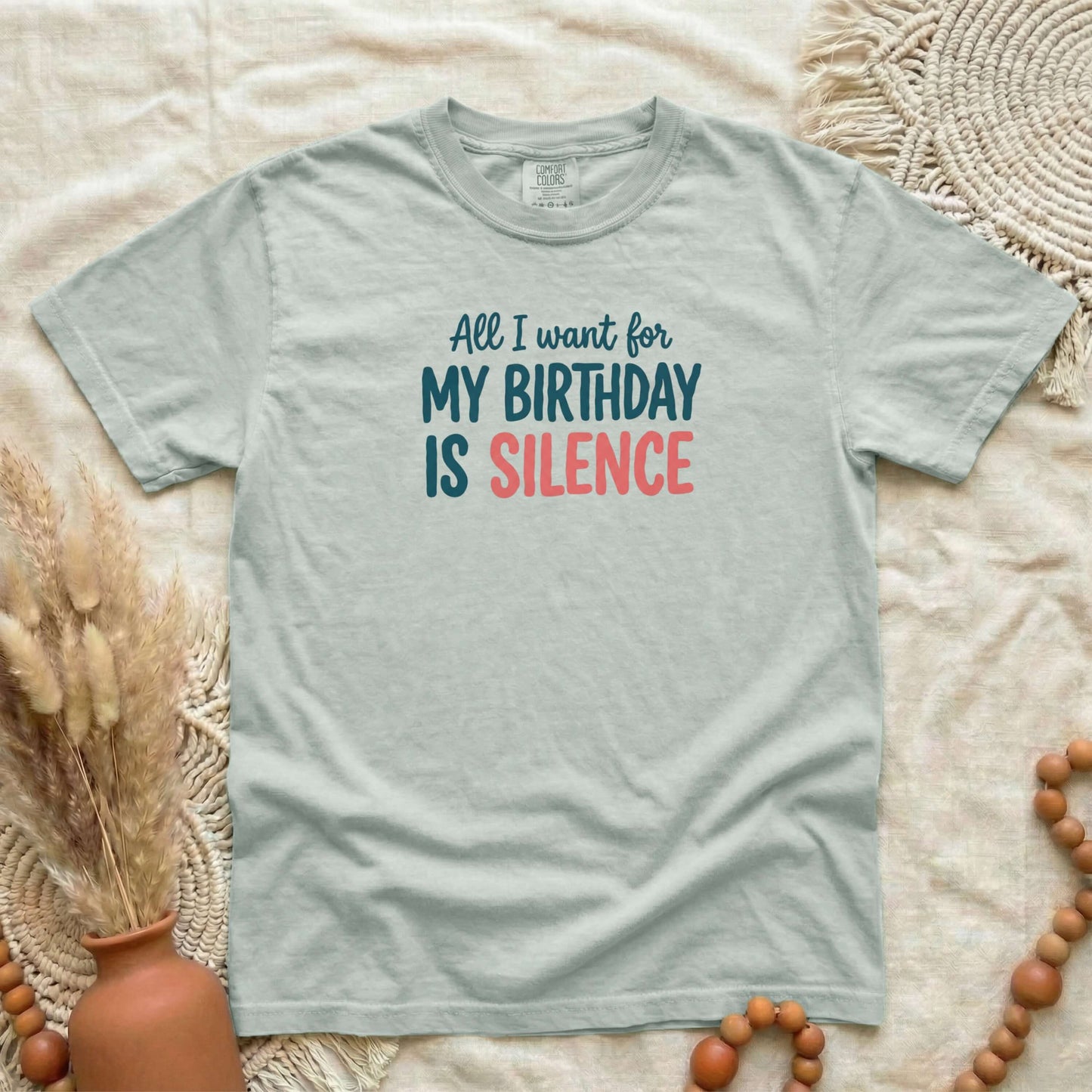 Bay garment-dyed cotton tee printed with "All I Want For My Birthday Is Silence".