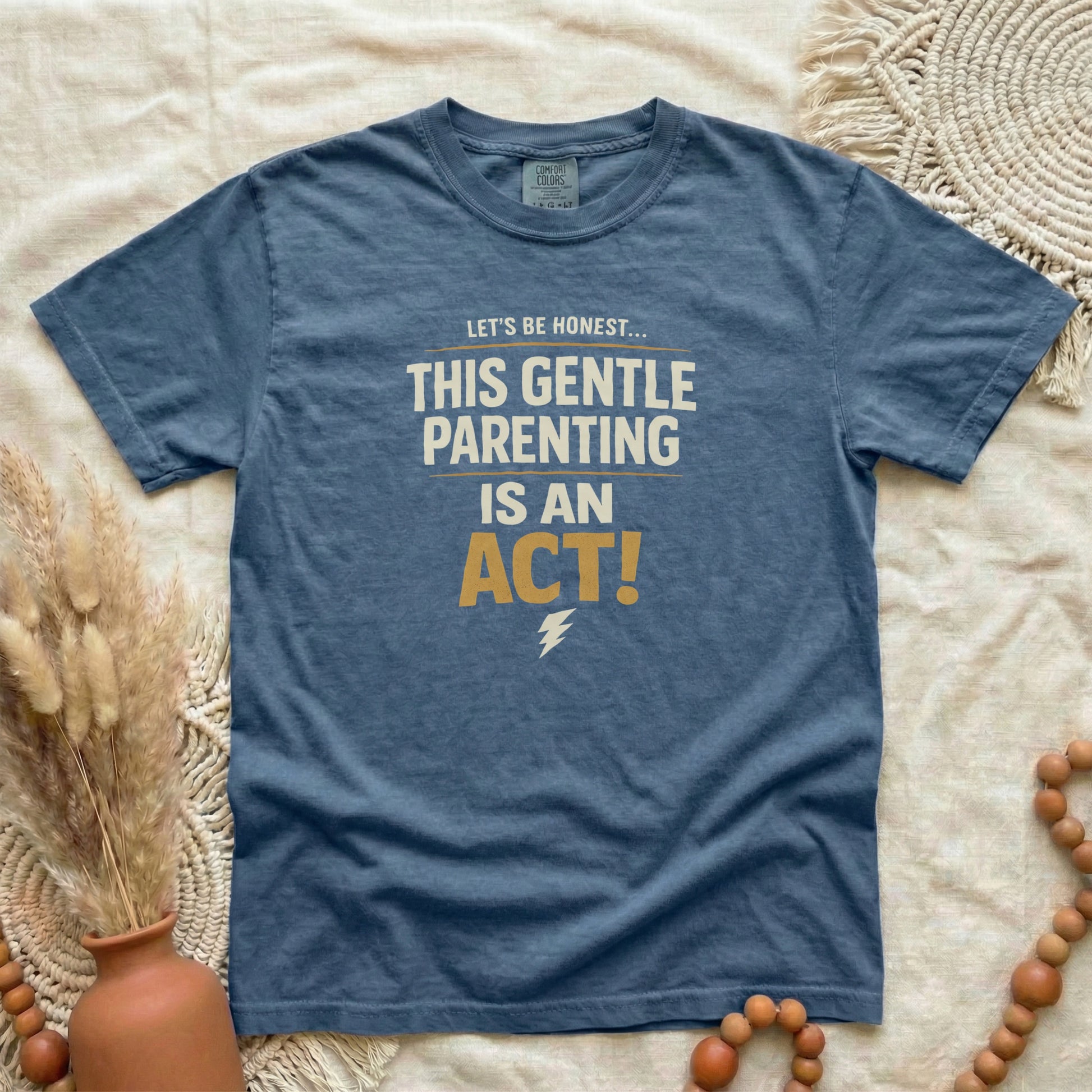 Denim garment-dyed cotton tee printed with "This Gentle Parenting Is An Act".