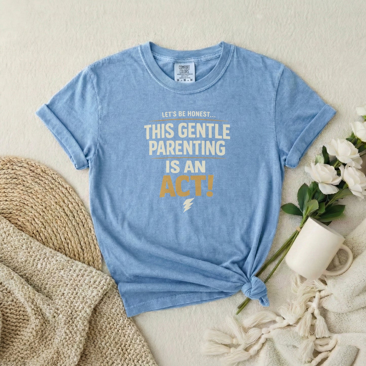 Washed Denim garment-dyed cotton tee printed with "This Gentle Parenting Is An Act".