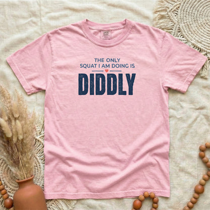 Blossom garment-dyed cotton tee printed with "The Only Squat I Am Doing Is Diddly".