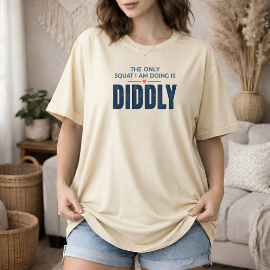 Ivory garment-dyed cotton tee printed with "The Only Squat I Am Doing Is Diddly".