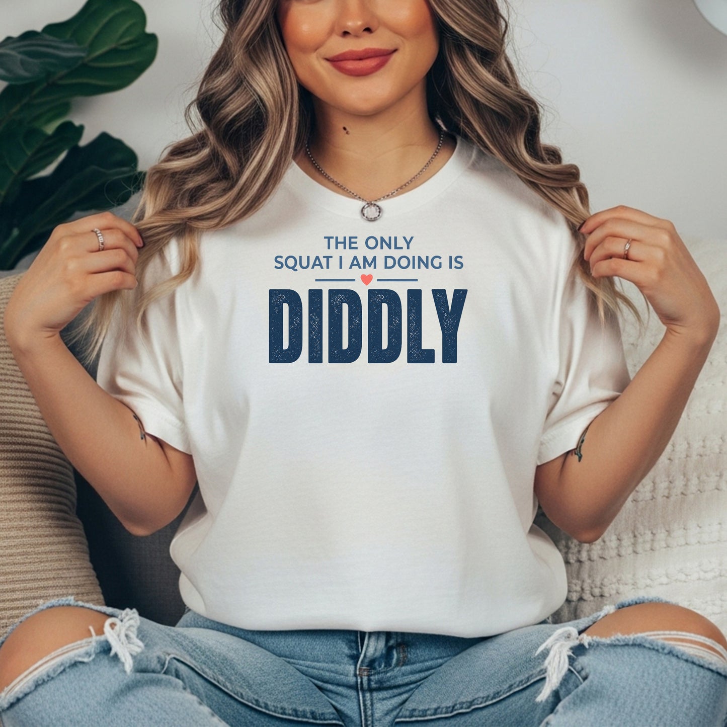 White garment-dyed cotton tee printed with "The Only Squat I Am Doing Is Diddly".