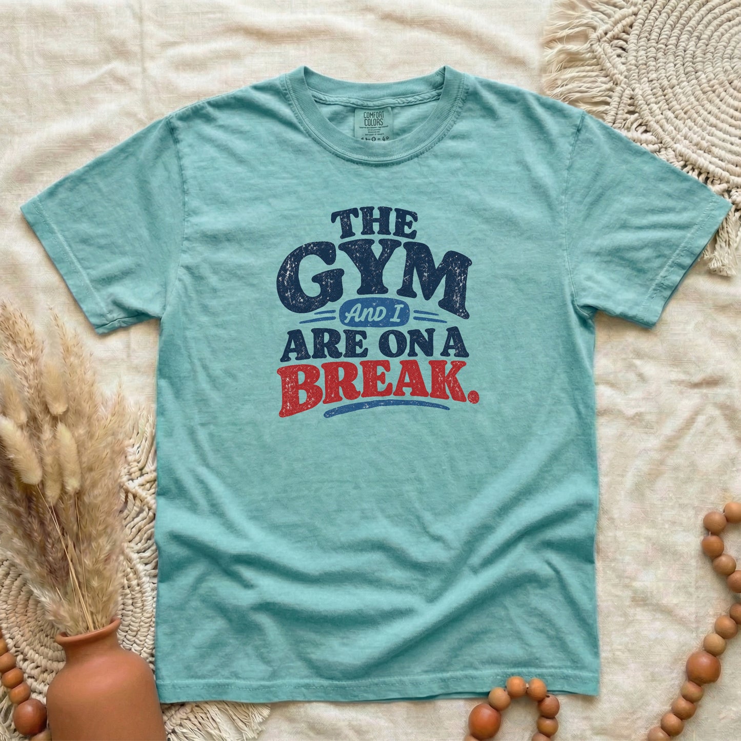 Chalky Mint garment-dyed cotton tee printed with "The Gym And I Are On A Break".