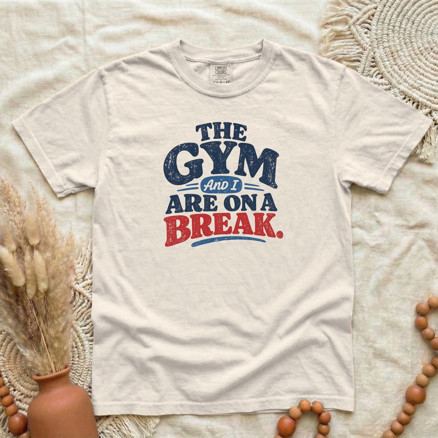Ivory garment-dyed cotton tee printed with "The Gym And I Are On A Break".