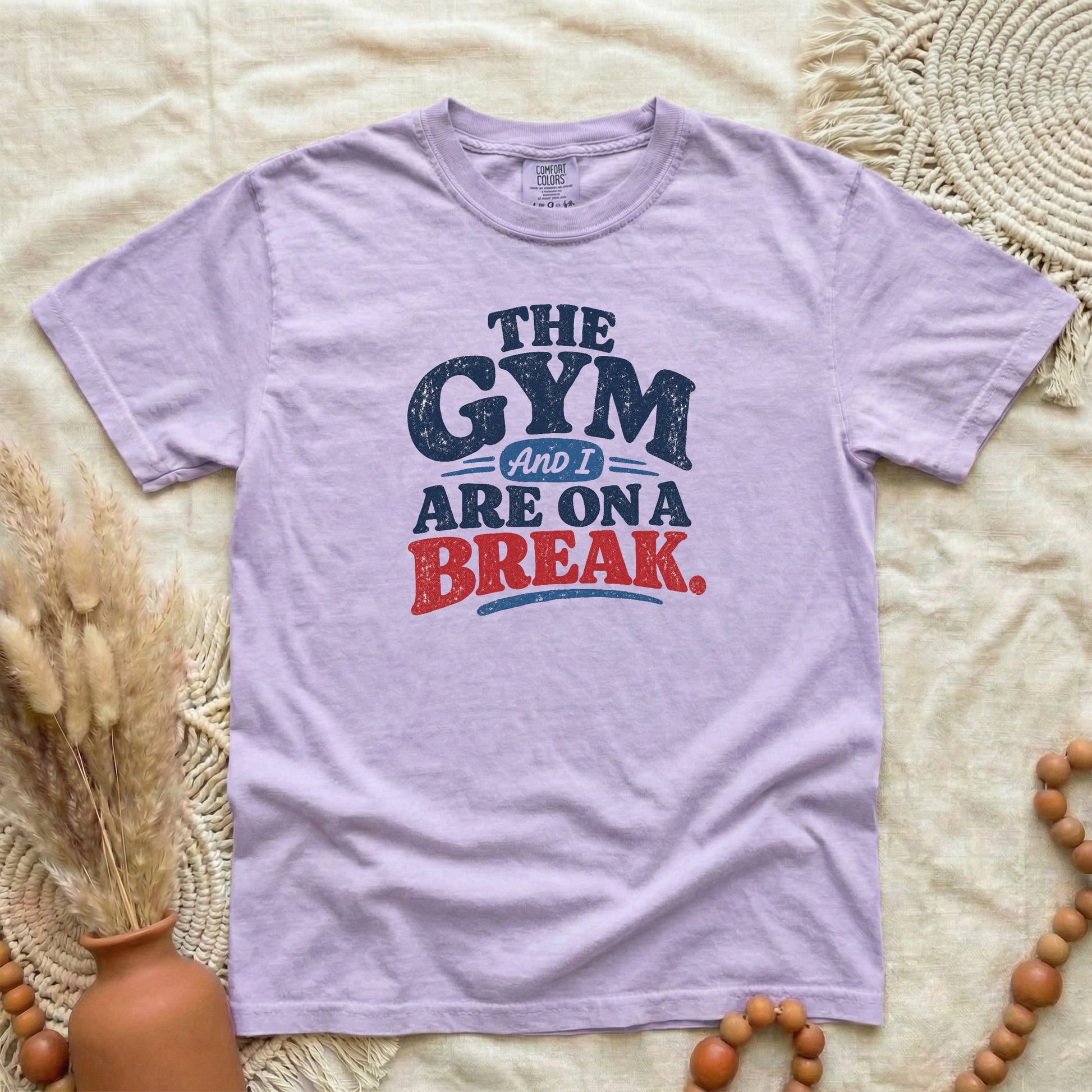 Orchid garment-dyed cotton tee printed with "The Gym And I Are On A Break".