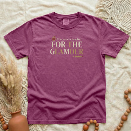Berry garment-dyed cotton tee printed with "I Became A Teacher For The Glamour".