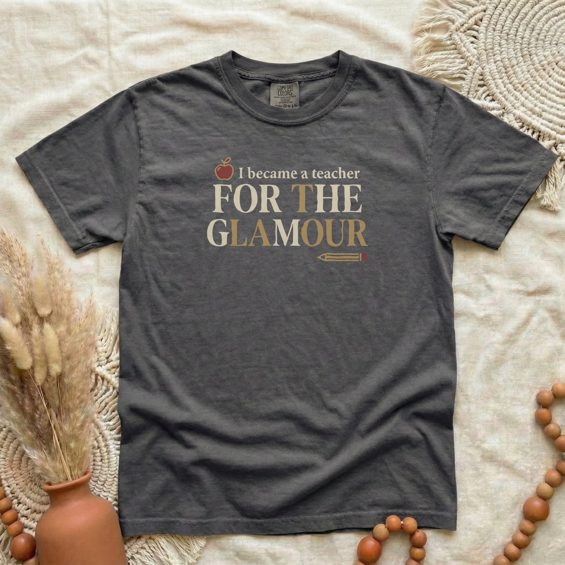 Pepper garment-dyed cotton tee printed with "I Became A Teacher For The Glamour".
