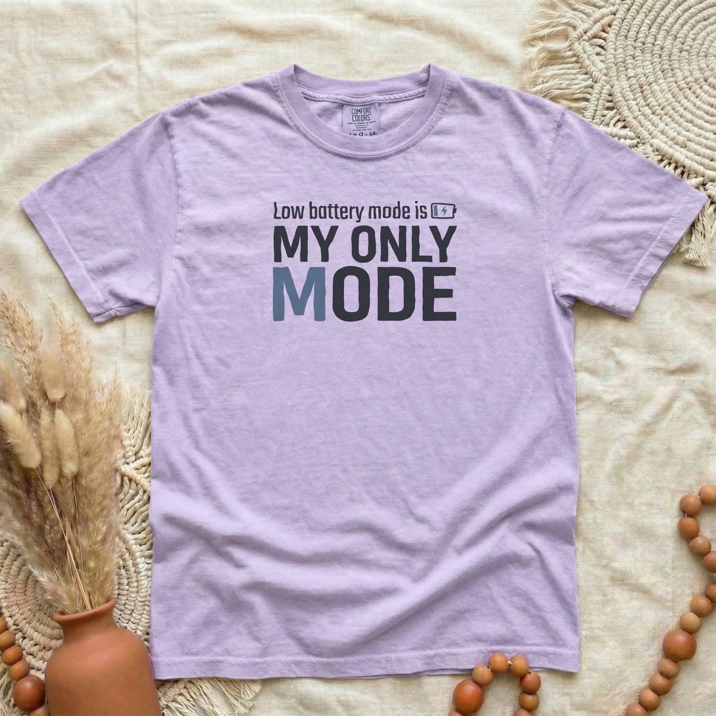 Orchid garment-dyed cotton tee printed with "Low Battery Mode Is My Only Mode".
