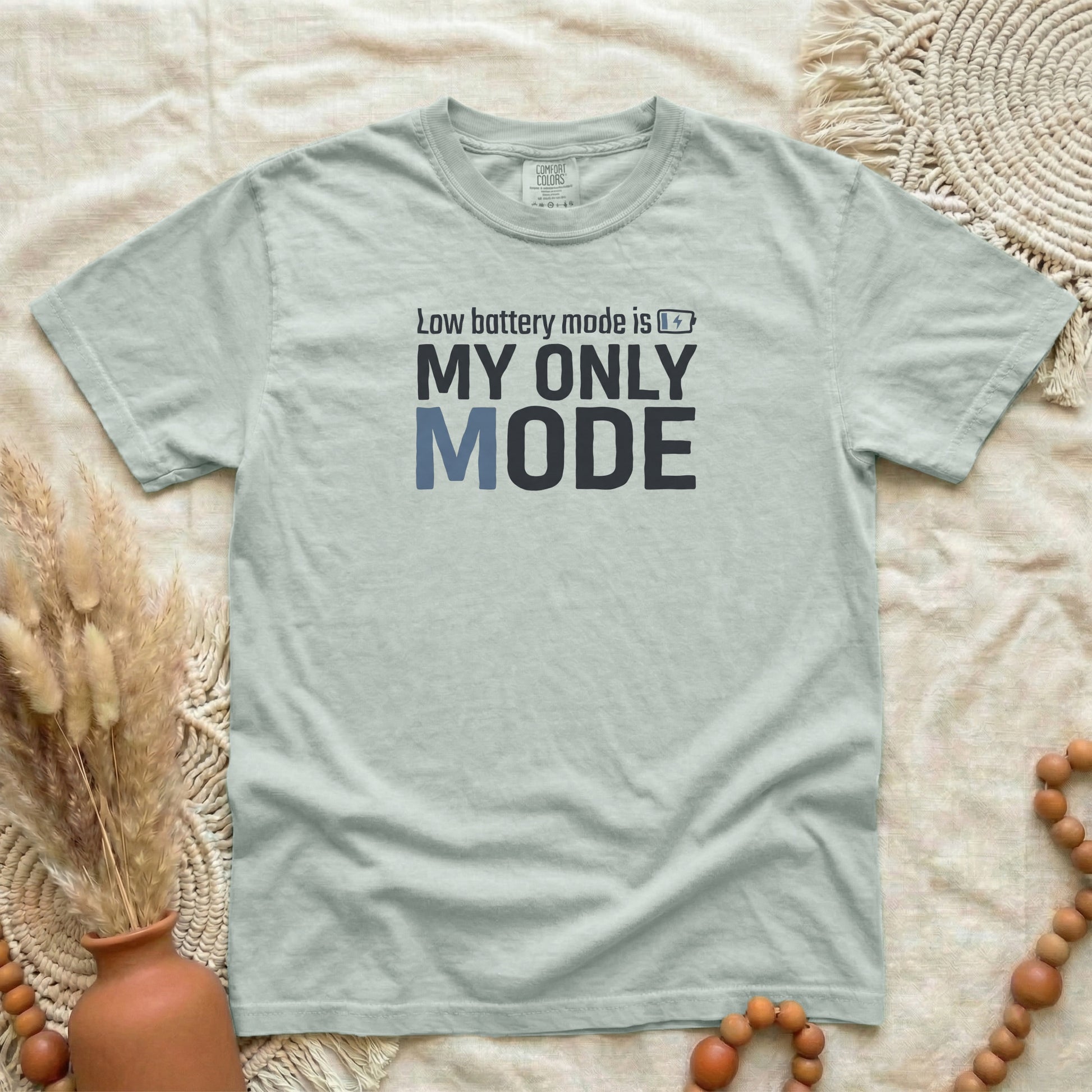 Bay garment-dyed cotton tee printed with "Low Battery Mode Is My Only Mode".