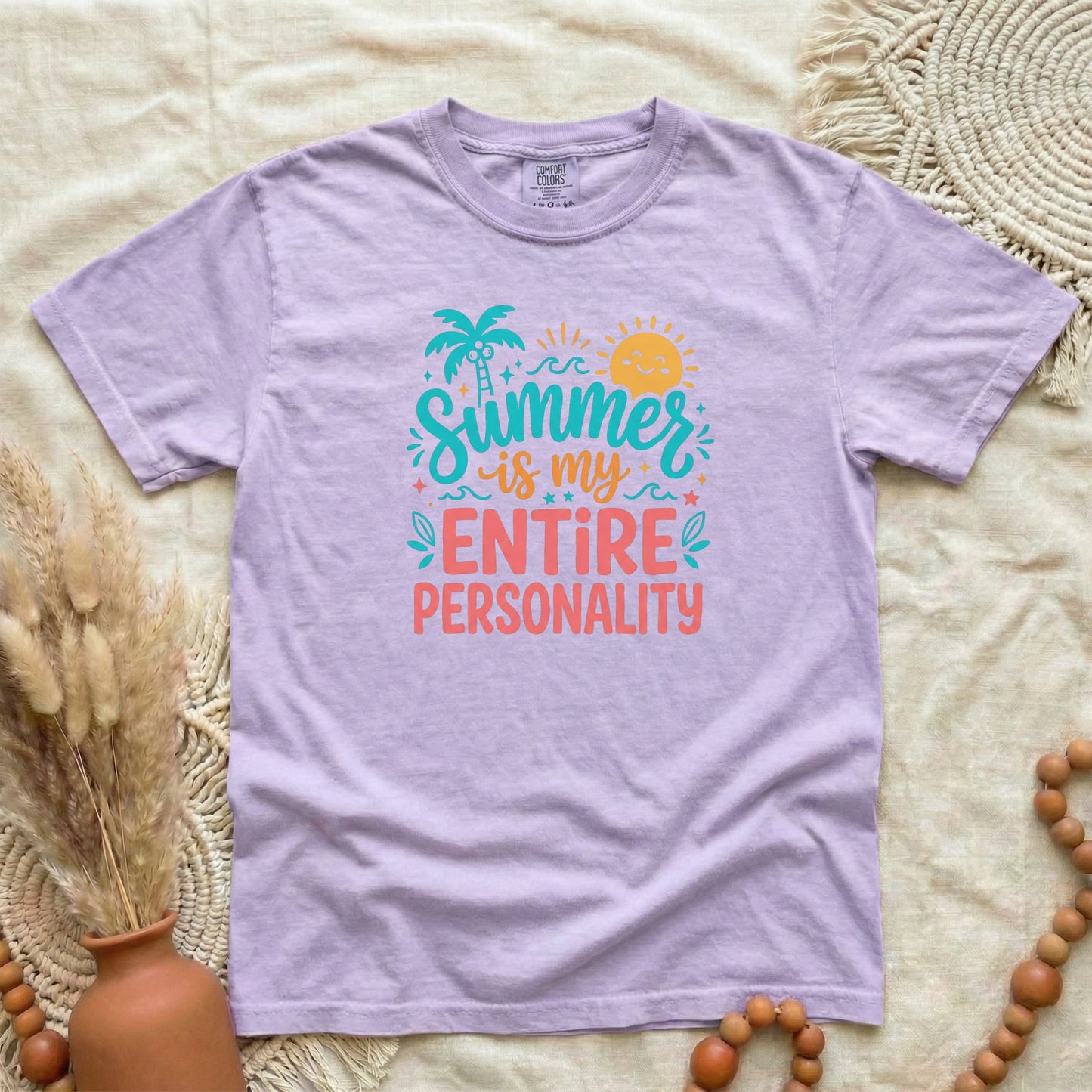 Orchid garment-dyed cotton tee printed with "Summer Is My Entire Personality".