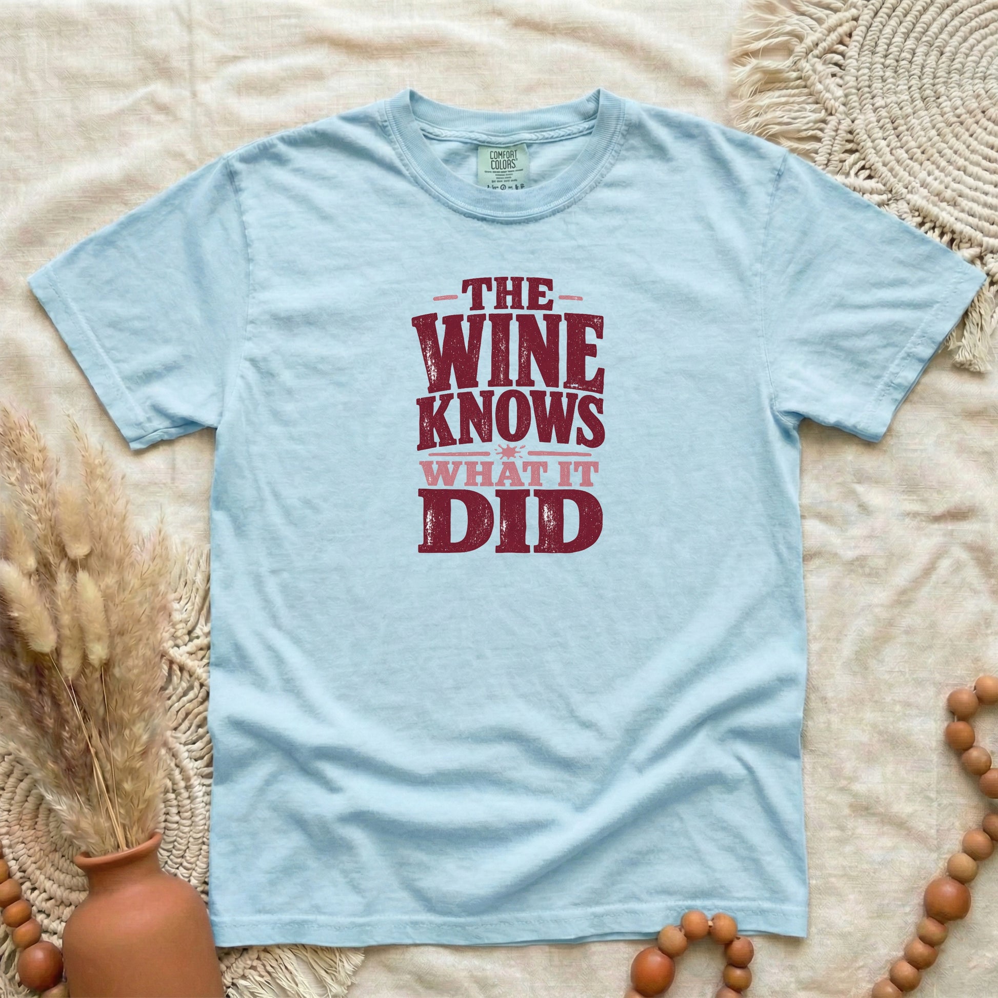 Chambray garment-dyed cotton tee printed with "The Wine Knows What It Did".