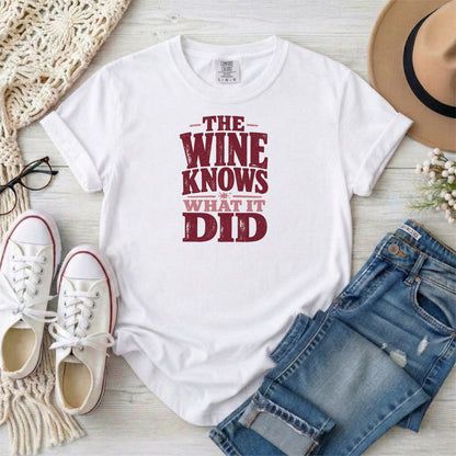 White garment-dyed cotton tee printed with "The Wine Knows What It Did".